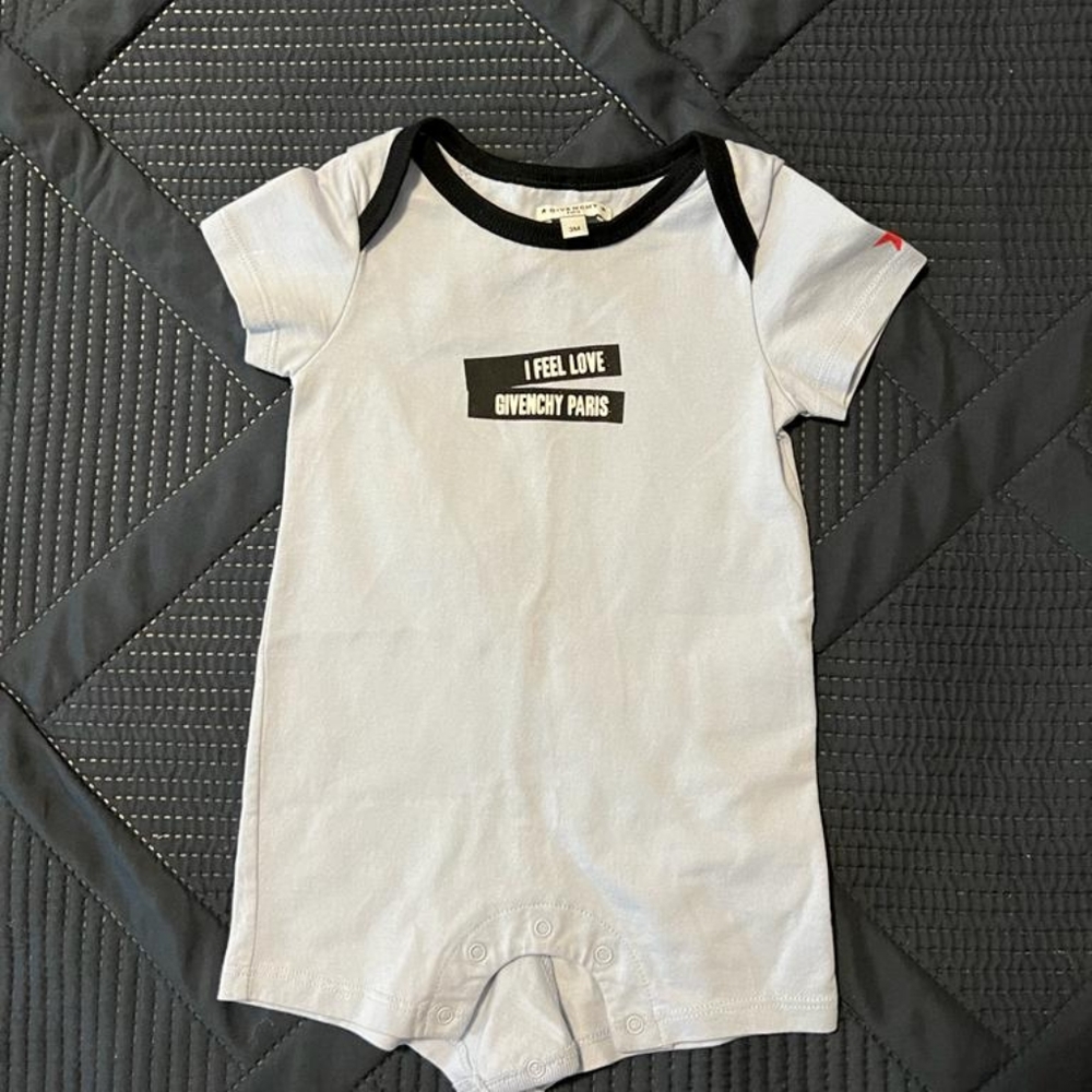 Burberry and Givenchy baby bodysuits